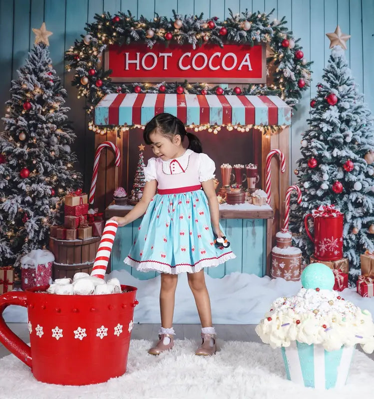Kate Christmas Tree Hot Cocoa Stand Blue Backdrop Designed by Emetselch