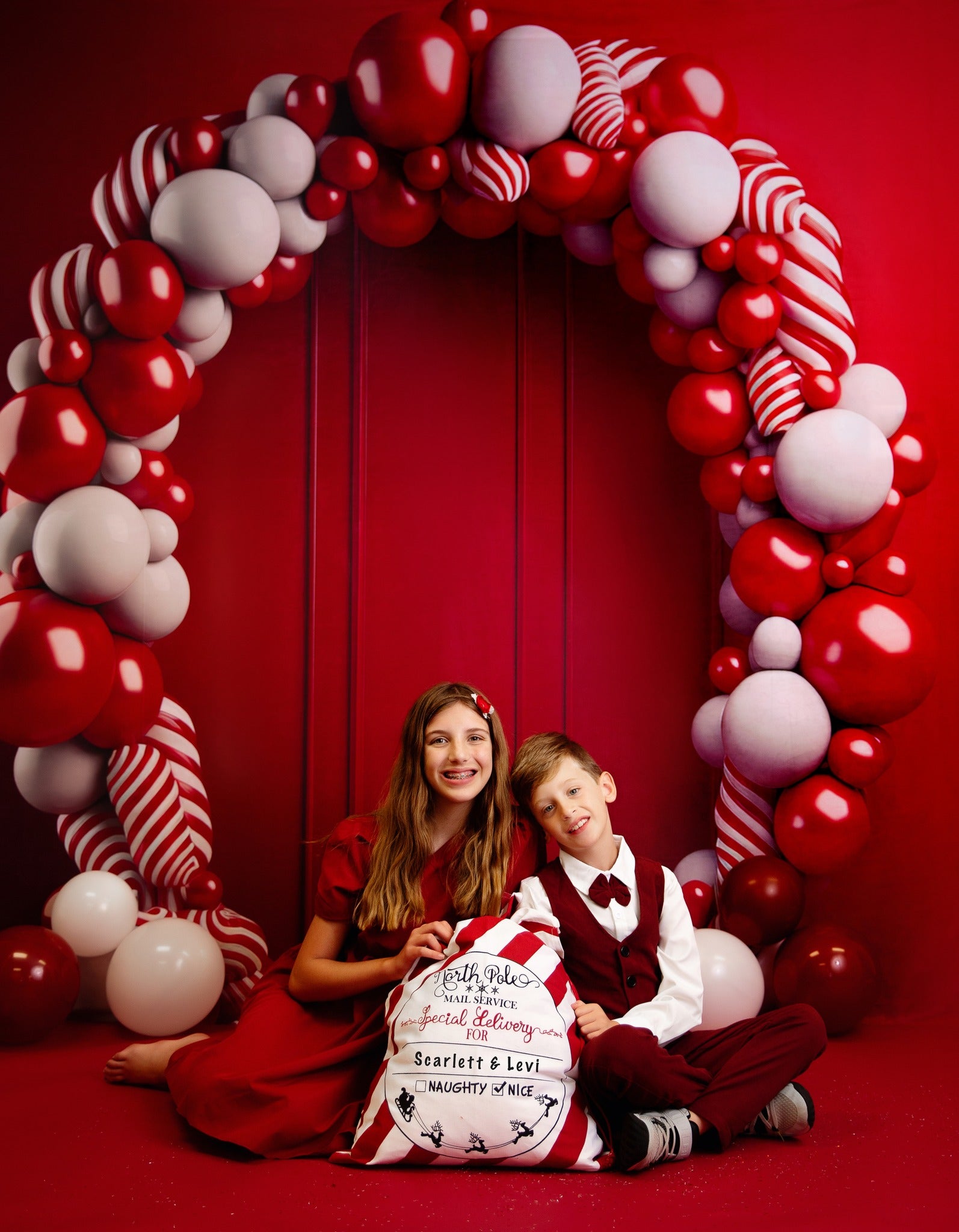 Kate Candycane Balloons Arch Red Wall Backdrop Designed by Megan Leigh Photography -UK