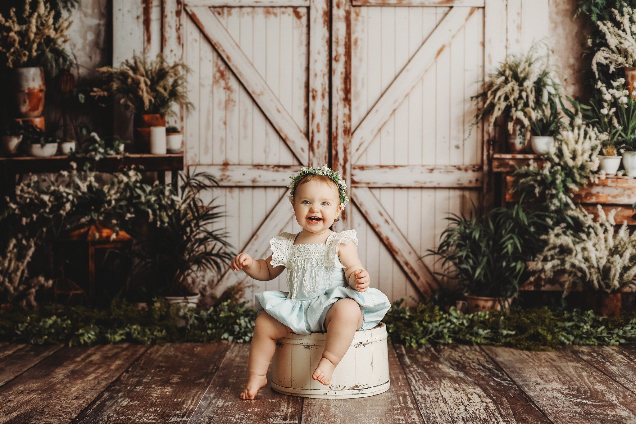 Kate Spring White Barn Door With Green Plants Backdrop Designed by Emetselch