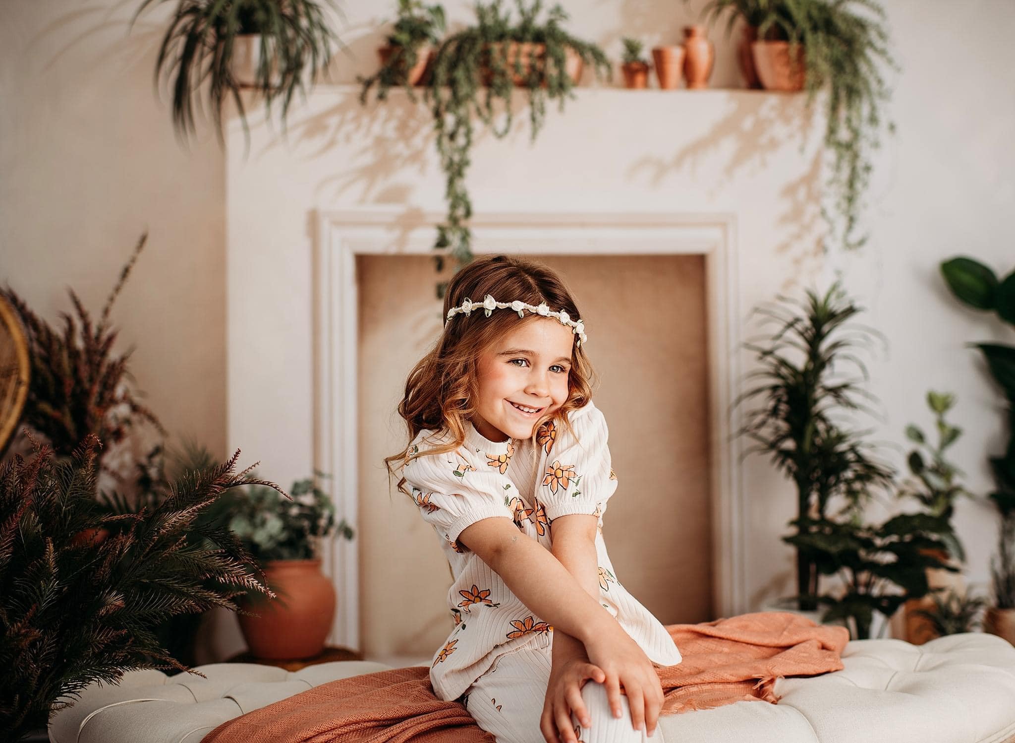 Kate White Fireplace With Spring Greenery Backdrop Designed by Emetselch -UK