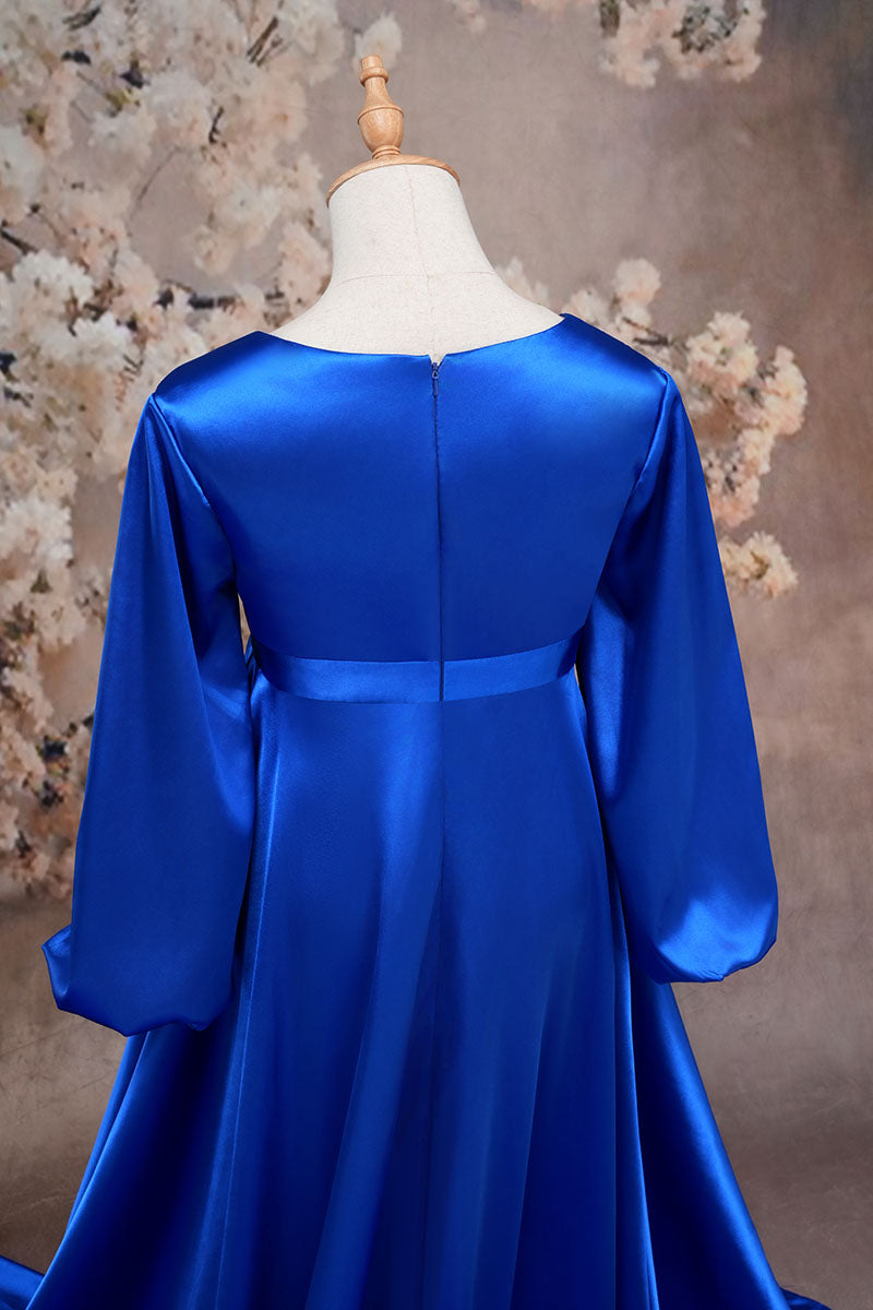 Detail shot of the back of a blue long sleeve satin maternity dress