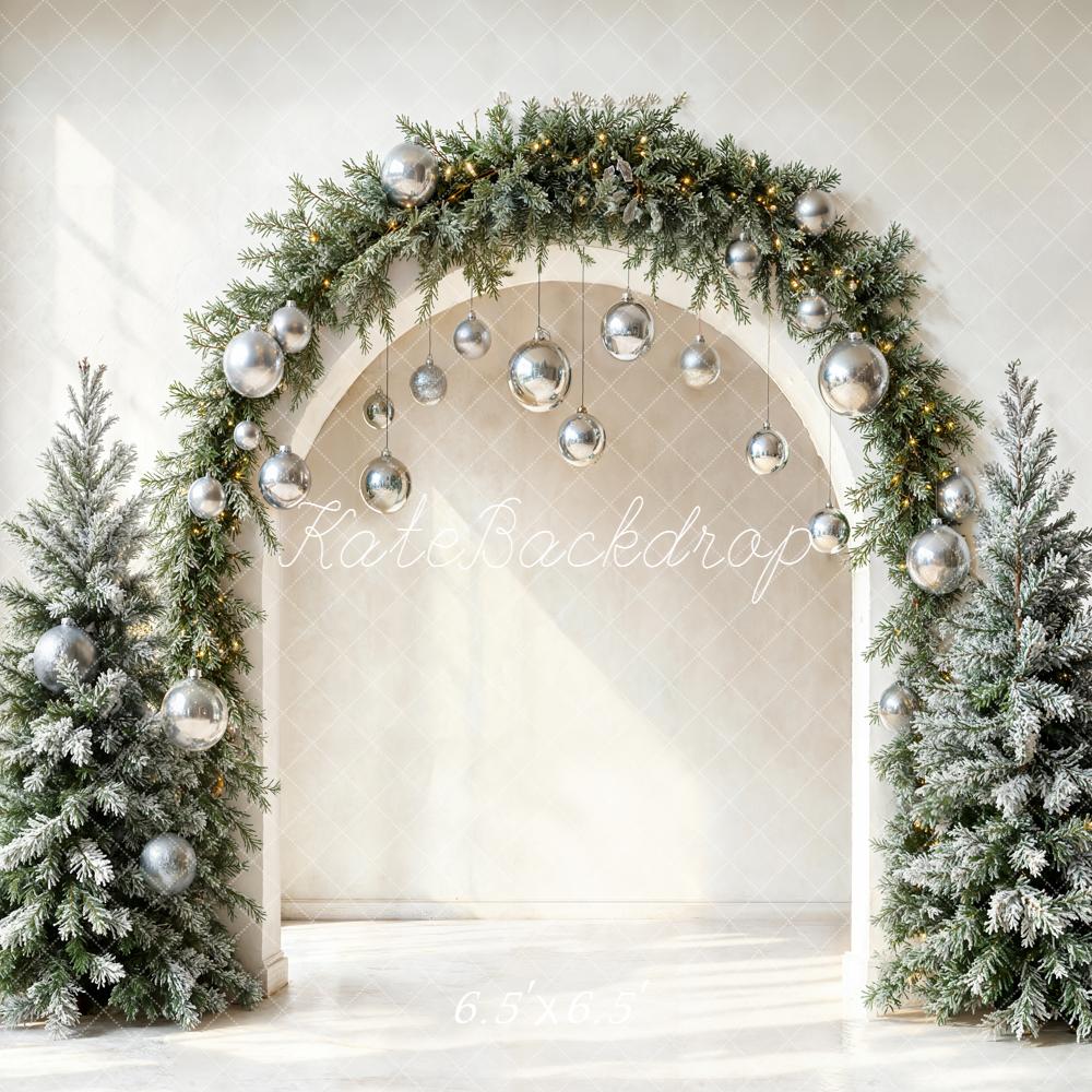 Kate Christmas Arch Silver Baubles Frosted Trees Backdrop Designed by Emetselch