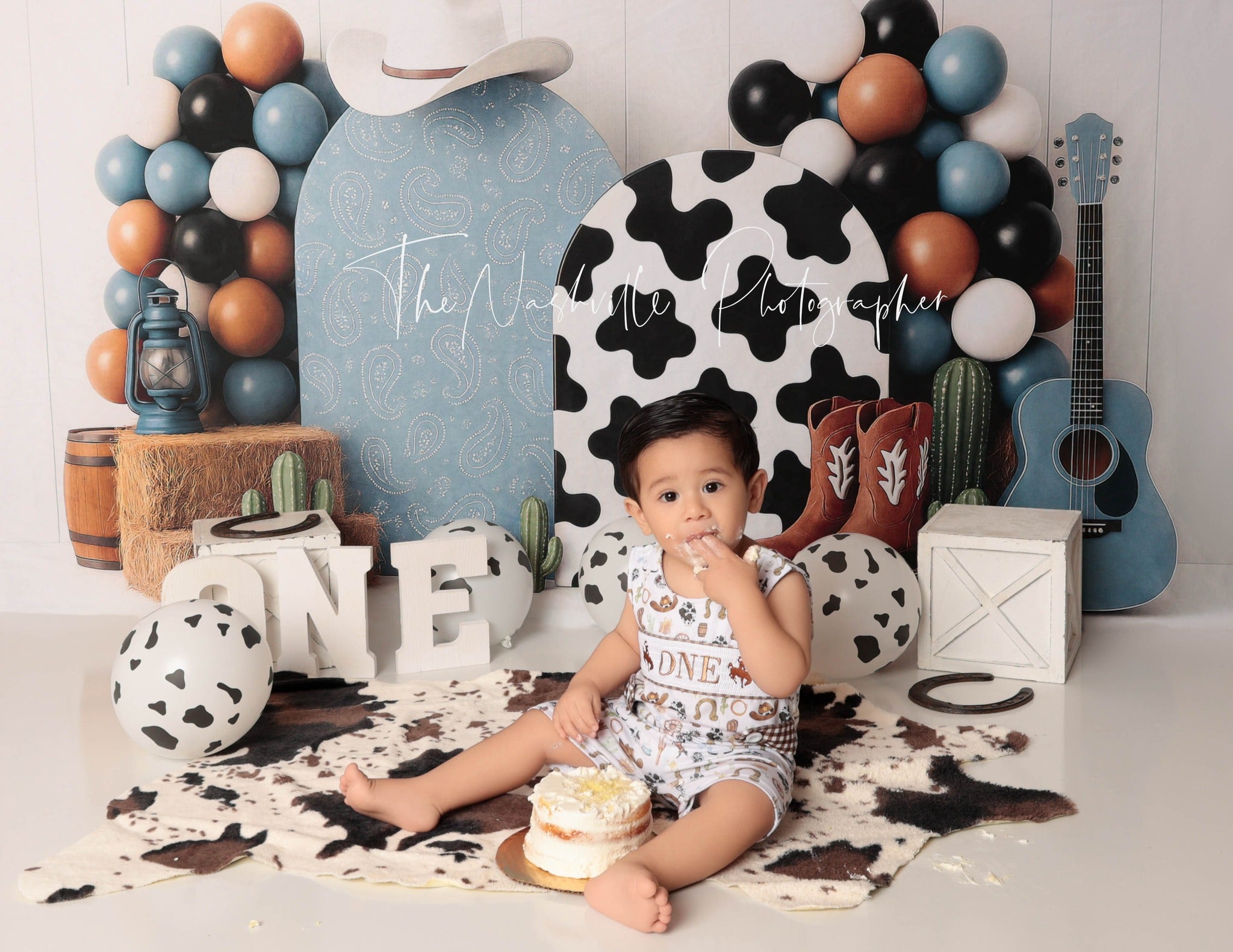 Kate Cake Smash Western Cowboy Boots Blue Backdrop Designed by Ashley Paul -UK