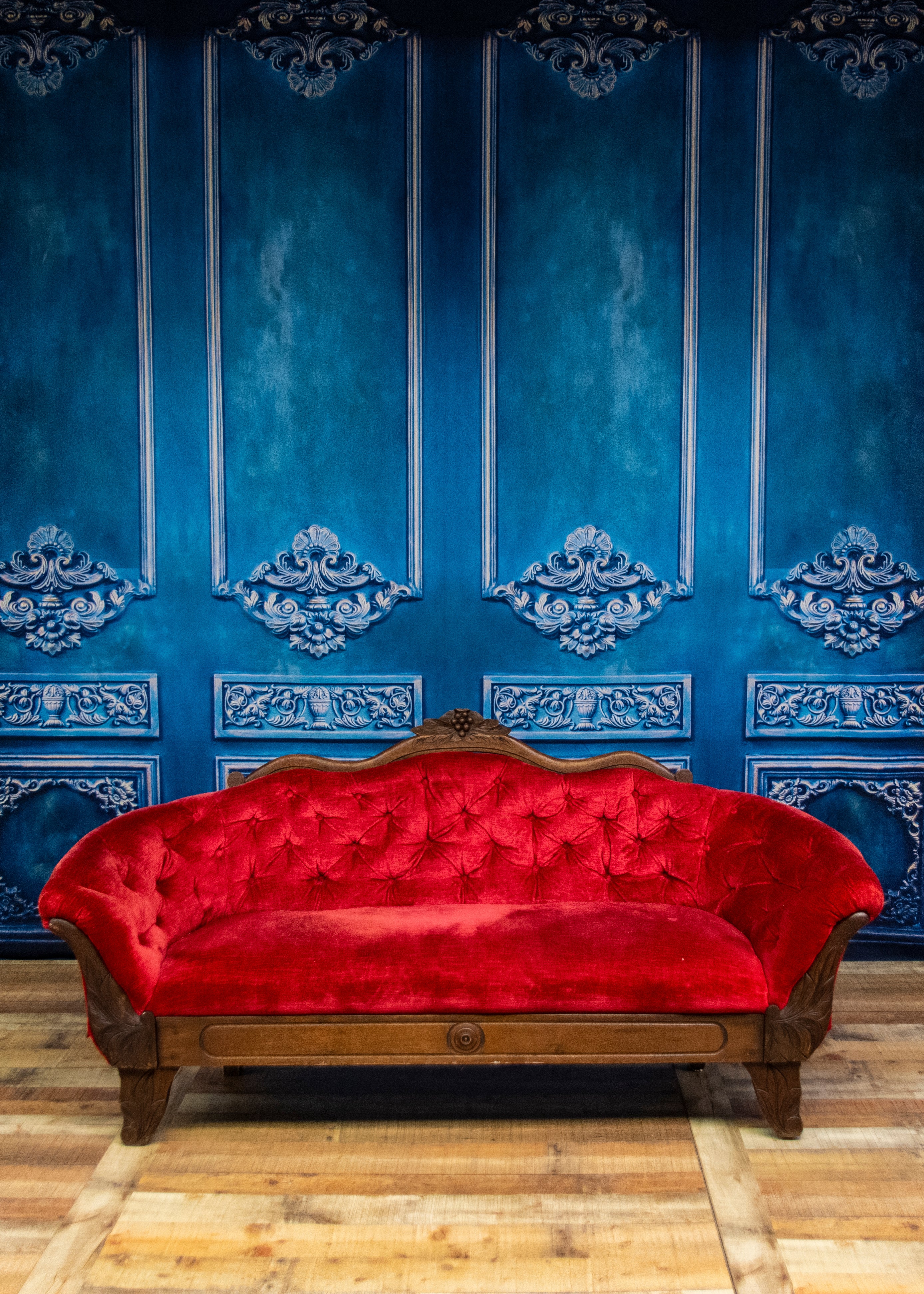 Kate Bule Wall and Red Sofa Designed by Thousand Words Photography