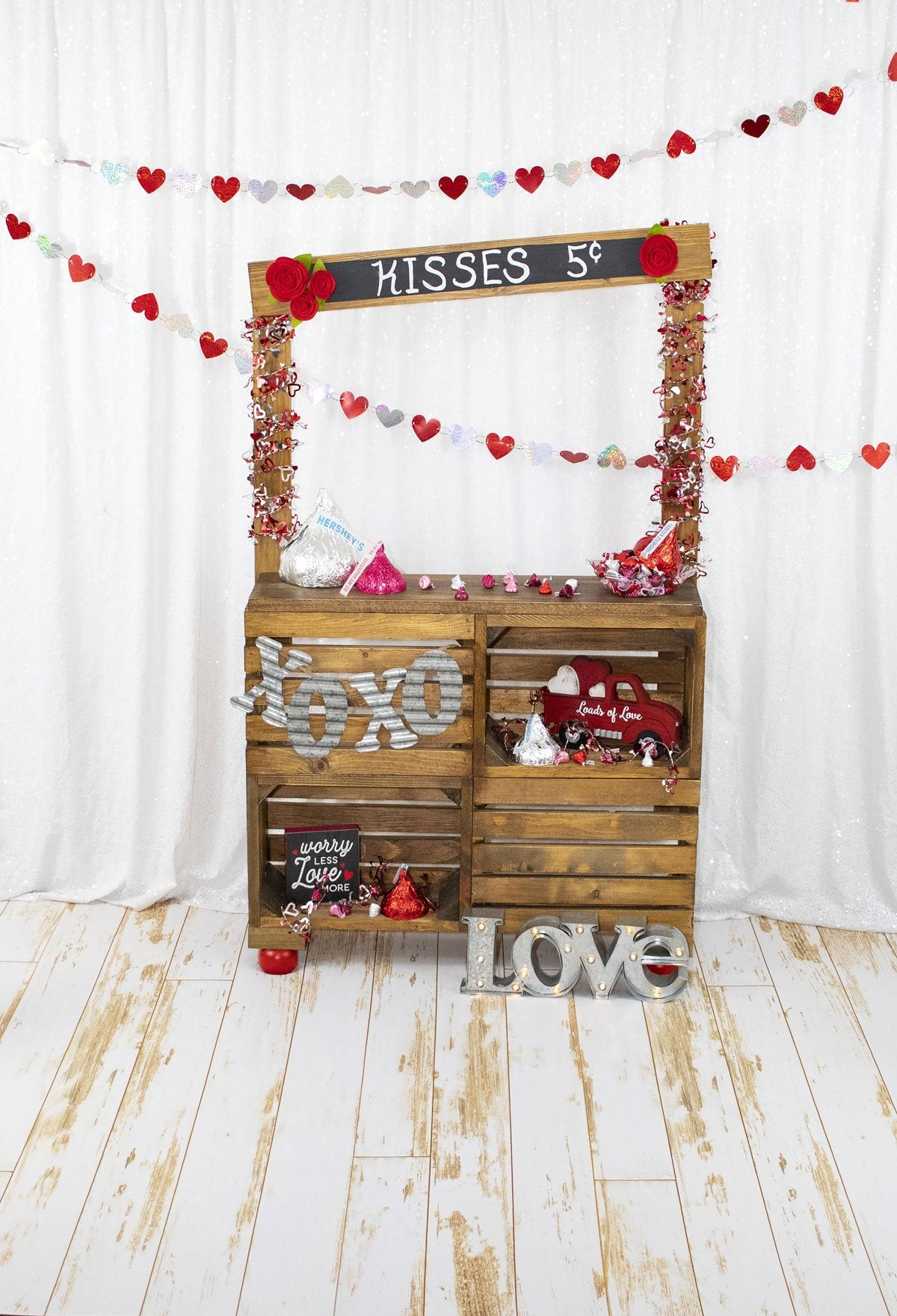 Kate White Curtain Kisses booth Valentine's Day Backdrop Designed by Leann West -UK